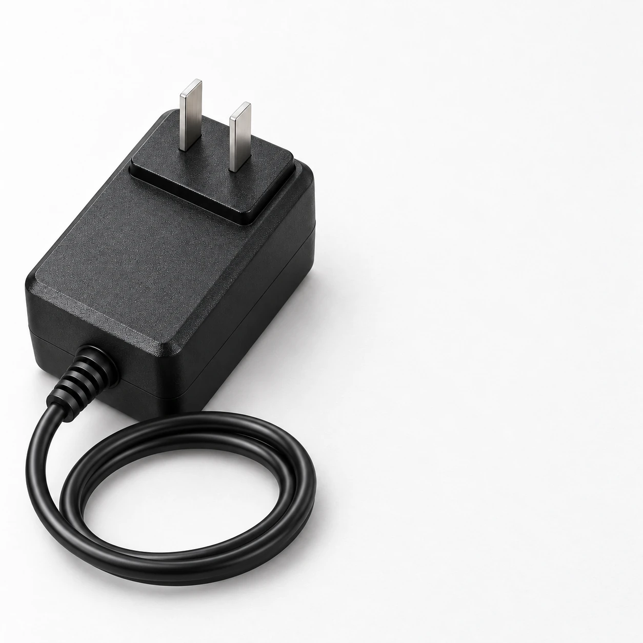 adapter on a white background with its coiled cable